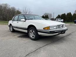 Image result for White 1991 Pontiac