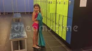 Maybe you would like to learn more about one of these? Girl Teenager In The Locker Room Wipes Himself With A Towel Booths Slow Motion Video For Changing Clothes After The Stock Video Video Of Sport Booth 99851159