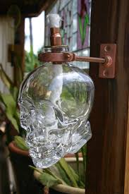 Pin By Thomas Huckaby On Man Cave Crystal Head Vodka Tiki Torches Oil Lamps Tiki Torches