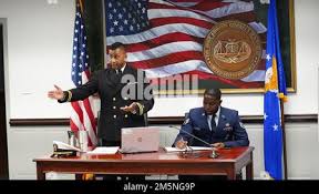 Air Force Staff Sgt. Quincy Garner of Acton, Mass., plays "Taps" in memory  of Sen. Edward Kennedy prior to a baseball game between the Boston Red Sox  and the Chicago White Sox
