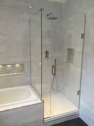 Frameless Shower Enclosure With Tray Butting Up To Bath End Installed In Barnet Frameless Shower Enclosures Shower Bath Combo Bathroom Tub Remodel