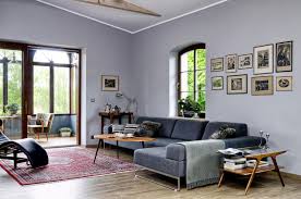 Sculptural wood tables complement leather side chairs and a gray upholstered sofa in a massachusetts living room design crafted by found design studio. Large Living Room With Gray Sofa Interior Design Ideas Ofdesign