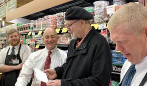 Super One donates $5,000 to Sharing Bread Soup Kitchen