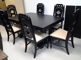Furniture with detailing that mirrored that of gothic revival buildings appeared in the same period. Black Gothic Table And Chairs Customized Here At The Shop Gothic Table Table Dining Table