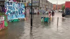Streets and cars submerged as biblical rain smashes capital. Ieageclbdostym