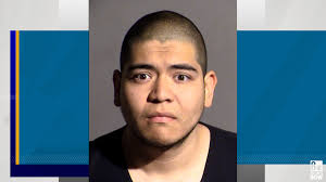 Las Vegas police: Man fired dozens of gunshots at officers, helicopter