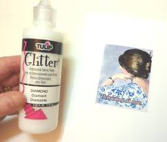 This video tutorial shows how to add glitter onto paper. Card Making Ideas Adding Glitter Scrolls As Embellishments