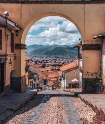 national geographic your shot on instagram photo by bb goralka102 a panoramic view of cusco through the santa ana arch pe peru holiday destinations cusco