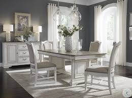 The antique white finish of this dining room set gives it a beautiful and elegant touch. Pin On Furniture