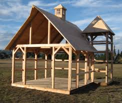 Winter landscape with a frame country house in the mountains, spruces, snow in cartoon flat style. Timber Frame Kit