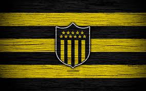 Club atlético peñarol —also known as carboneros, aurinegros and (familiarly) manyas— is a uruguayan sports club from montevideo. Penarol Fc Logo Uruguayan Primera Division Emblem Wooden Texture Uruguay Hd Wallpaper Peakpx