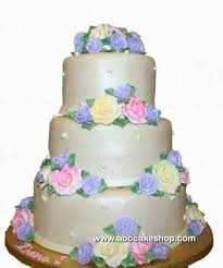Fresh flowers are used for this cake and flower types are subjected to seasonal availability. Pastel Flower Adorned Wedding Cake Abc Cake Shop Bakery