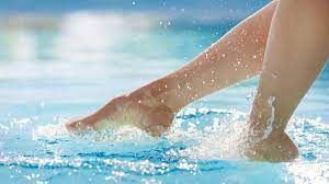 Several boys and girls are playing at a pool in their swimming suits. Calgary Cancels All Ages Naked Pool Party Amid Outrage Bbc News