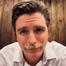 What books or guest speakers can improve a film class's cinematography  course?