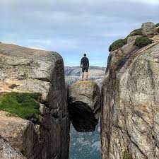 Kjeragbolten, norway 2020 🇳🇴 a 5 cubic metre glacial deposit, kjeragbolten is a boulder on kjerag mountain which sits 984 metres above lysefjord #travel #adventure #explore #nationalgeographic #natgeo #photography #travelphotography #backpacking #norway #scandinavia #europe #fjord #lysefjord #kjerag #kjeragbolten #hiking #walking #trekking #boulder #glacial Preikestolen Kjerag Besteige Den Hochsten Berg Am Lysefjord