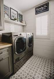 Farmhouse Laundry Room With Cement Tile Flooring White Shiplap Walls And White Subway Tile Backs Farmhouse Laundry Room Laundry Room Remodel Laundry Room Tile
