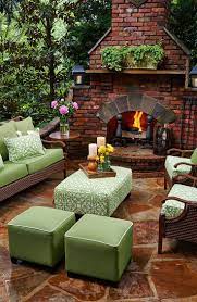 Cozy Outdoor Living Space Natural Wicker Outdoor Furniture Green Comfy Cushions Brick Stone Outdoor Outdoor Fireplace Designs Backyard Patio Designs Backyard