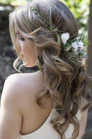 This hairstyle creates a bit of an illusion due to the fact that her hair is pulled back into a very tight 20 Hairstyles For Your Rustic Wedding Rustic Wedding Chic