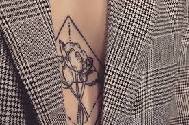 36 Of The Coolest Ideas For Between The Boobs Tattoos We Ve Ever Seen