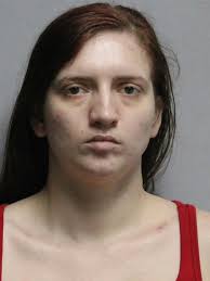 Woman accused of trying to run over family