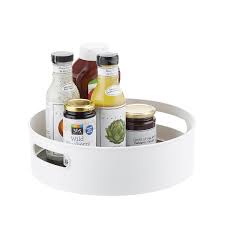 Whether it's keeping condiments and/or spices together in the pantry or making food accessible for everyone at the dinner table, the rotating tray is a staple in the kitchen. A Lazy Susan Makes Everything A Little Bit Easier Epicurious