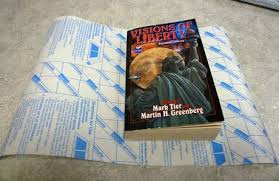 How To Cover A Paperback Book With Clear Plastic Film Paper Book Covers Clear Book Covers Book Cover Diy