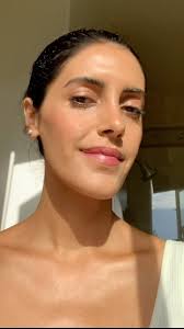 @athena.wellness wears: , True Skin Radiant Priming Serum mixed with Liquid  Light Serum Highlighter in Nova, True Skin Serum Foundation in Catalina,  True Skin Serum Concealer in Kava, Multi-Stick in A ...