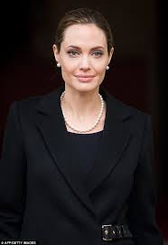 Her hair color is a bit too light for such a dark blue (though it has golden tones which autumns should aim for when coloring their hair), and the style of the dress is in frumpy frock territory (i'm sure the velvet doesn't. Angelina Jolie Turns Elder Stateswoman With The Grey Hairs To Match At G8 Summit Daily Mail Online