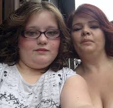 Goodbye my angel princess: Mother lays flowers at crossing where daughter,  12, was killed by van after council axed lollipop ladies in austerity drive 