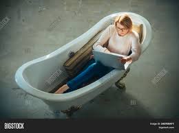 girl relax bathtub image & photo (free