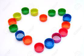 Imagenes de tapitas para recortar. Corazon Hecho De Coloridas Tapas Plasticas Heart Made From Colorful Plastic Caps Colores Colors Tapas De Botellas Tapas Plasticas Corazones