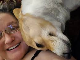 Buddy disapproves if anyone interrupts cuddle time with his friend cucumber.