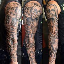 The day of the dead tattoos, also known as dia de los muertos, is a holiday that falls at the end of october, overlaps with halloween, and ends on november 2nd. Day Of The Dead Sleeve By Whitney At Human Kanvas Sleeve Tattoos Skull Sleeve Tattoos Skull Sleeve