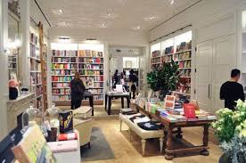 Toby S Estate S Flat Iron Cafe With Strand Books At Club Monaco Club Monaco Cafe Design Bookshelf Styling