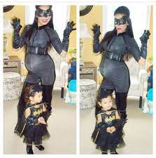 33 Weeks Pregnant Catwoman And Batgirl For Halloween Maternity Mommy Daughter Outfits Pregnant Halloween Costumes Cat Woman Costume
