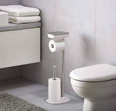 The toilet and bathroom vanity the open access holder allows toilet paper to be removed or replaced quickly and easily just slip the rolls in the top freeing up valuable bathroom cabinet space, this stand alone toilet roll holders metal feet will keep your extra paper supply clean. The Joseph Joseph Easystore Toilet Paper Holder Is Essentially An End Table For Your Bathroom
