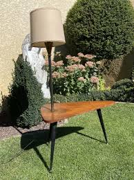 The tabletop and base offer plenty of storage space. 1960s Coffee Table End Table Low Table