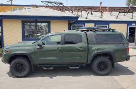 Post if you have pics of an 05 with a camper shell. 2020 Toyota Tacoma Are Overland Army Green Suburban Toppers