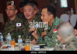 Singapore Army Col. Mark Tan Ken-Li, commander of 21st Division, speaks to  senior ranking military