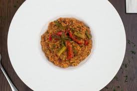 Mound couscous on a platter and top with stew, using a slotted spoon. Moroccan Couscous Jackslobodian