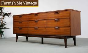 Newly refinished and ready to install. Nine Drawer Mid Century Modern Walnut Dresser