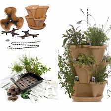 Apartment therapy shares these amazing mini planters, which are made from old twinings tea caddies. Garden Stacker Planter Indoor Herbal Tea Herb Garden Kit Grow Lemon Balm Catnip Marigold More Seeds Peat Pellets Greenhouse Tray Instructions Tuscany Color Stackable Planter Walmart Com Walmart Com