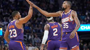 Booker, Durant lead Suns past Curry and Warriors 108-104 in season opener |  WETM - MyTwinTiers.com