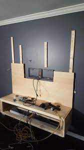 Diy Floating Entertainment Unit And Wall Covering Floating Entertainment Unit Diy Wall Unit Tv Wall Design