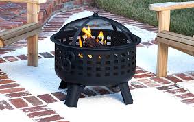 Large round steel wood burning fire pit with spark screen. The Best Fire Pits Under 250 In 2021 Solo Stove Biolite Amazon Rolling Stone