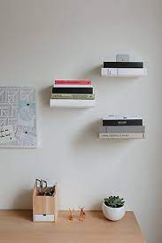 Umbra Small Conceal Floating Shelves Set Of 3 Ashley Furniture Homestore In 2021 Floating Bookshelves Floating Bookshelf Floating Shelves