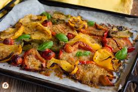 Ecco come preparare i peperoni al forno, con i consigli sul tempo di cottura e come spellarli, una volta cotti. Peperoni Gratinati Al Forno Contorno Con Panatura Speciale