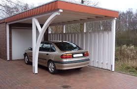 Lippe Exclusives Individual Carport Mit Monza Bogenpfosten Schieferblende Und Sichtschutzwand Gebaut Vor Einer Garage Carport Outdoor Decor Pergola