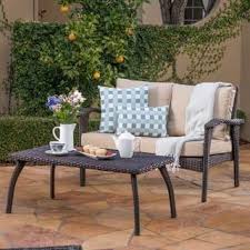 Honolulu Outdoor 2 Piece Wicker Loveseat And Coffee Table Set With Cushions By Christopher Knight Patio Furniture Fabric Patio Furniture Deals Wicker Loveseat