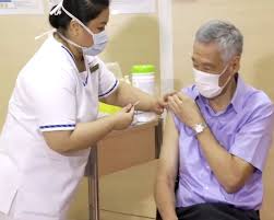 Singapore will start vaccinating schoolchildren against the coronavirus soon, the prime minister said monday, after officials warned that new strains were affecting youngsters more. Singapore Pm Receives Covid 19 Vaccine Urges Others To Follow